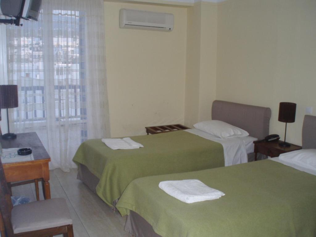 Delfinia Hotel Tínos Quarto foto