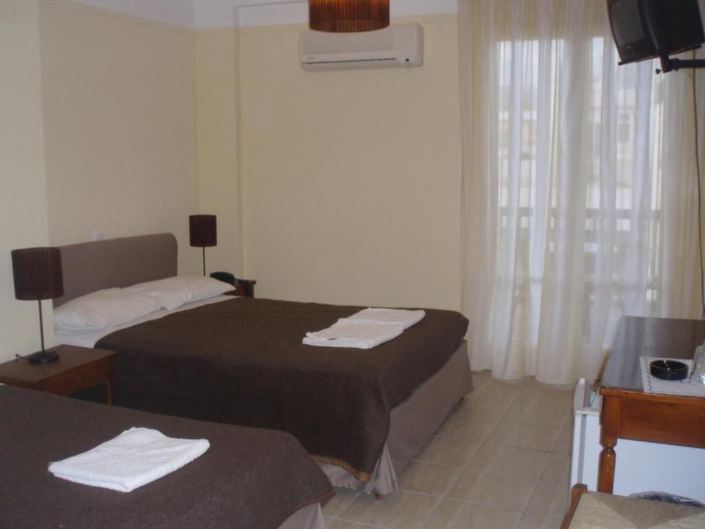 Delfinia Hotel Tínos Quarto foto