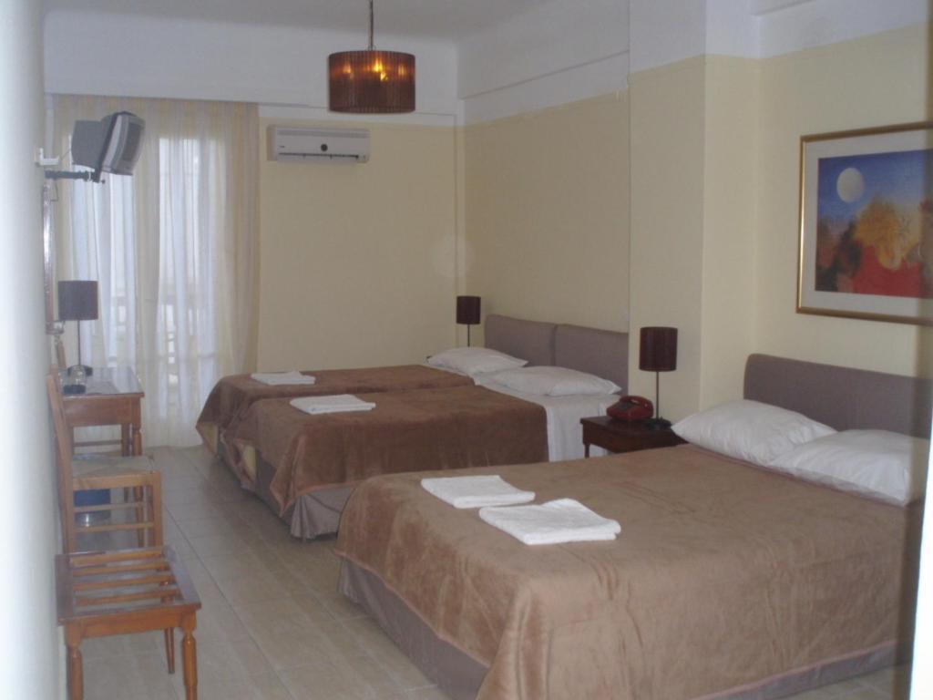 Delfinia Hotel Tínos Quarto foto