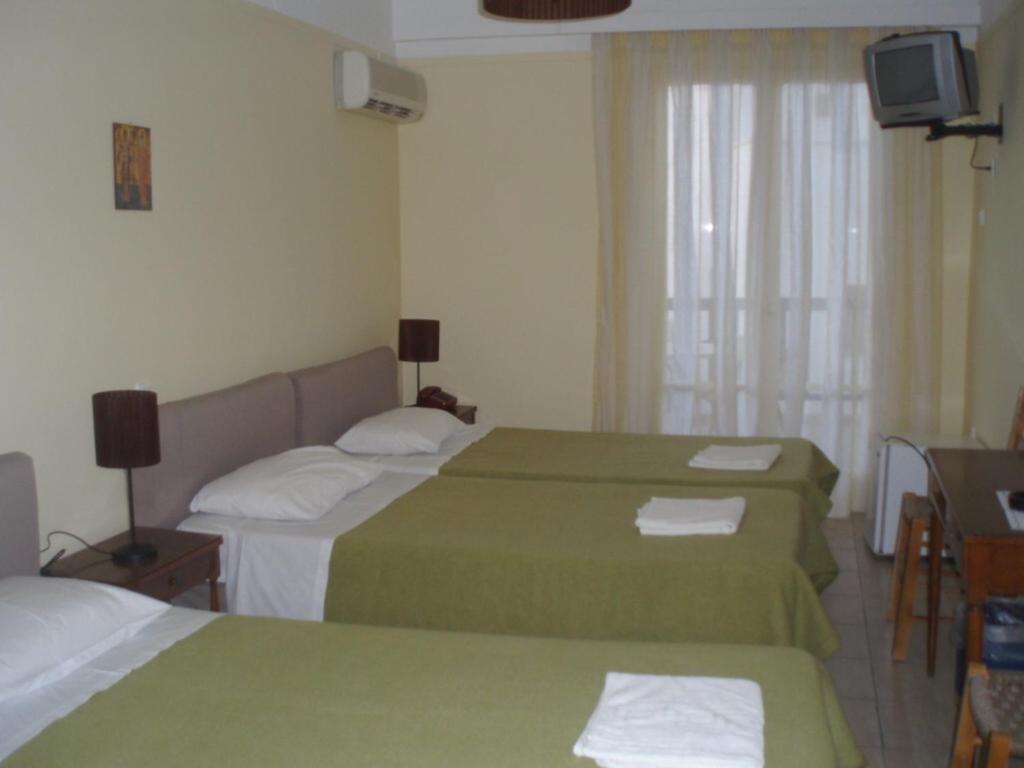 Delfinia Hotel Tínos Quarto foto